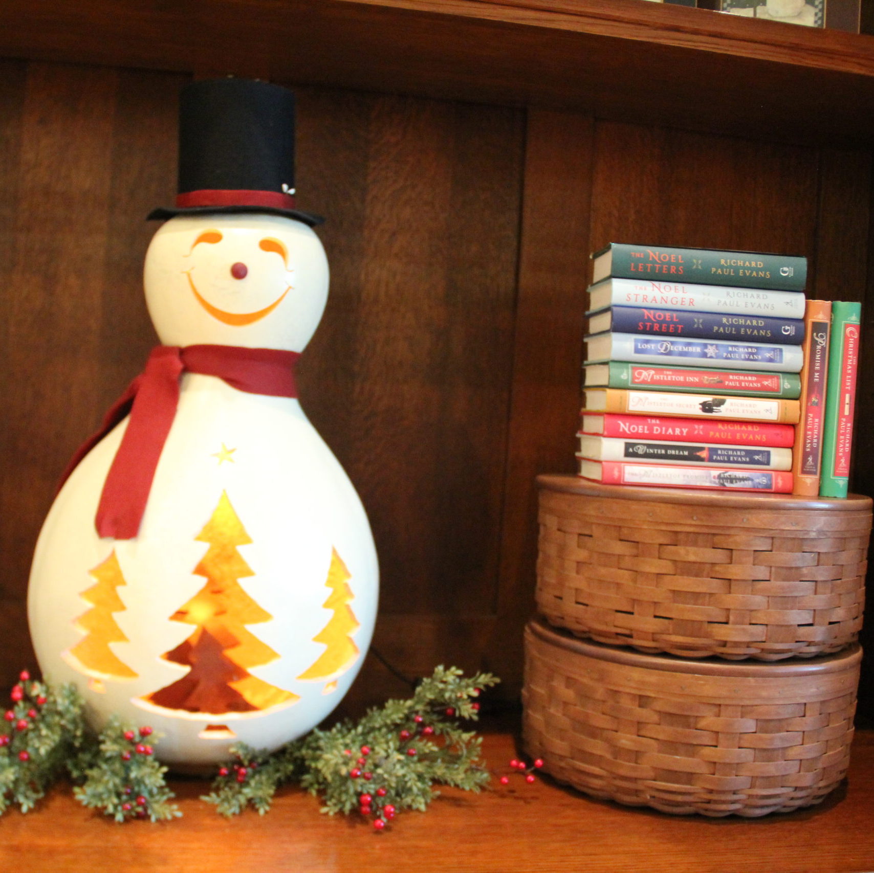 This jolly snowman is one of my favorite Meadowbrooke Gourds! With a couple of stacked Longaberger baskets and  holiday books by a favorite author I like how this turned out.