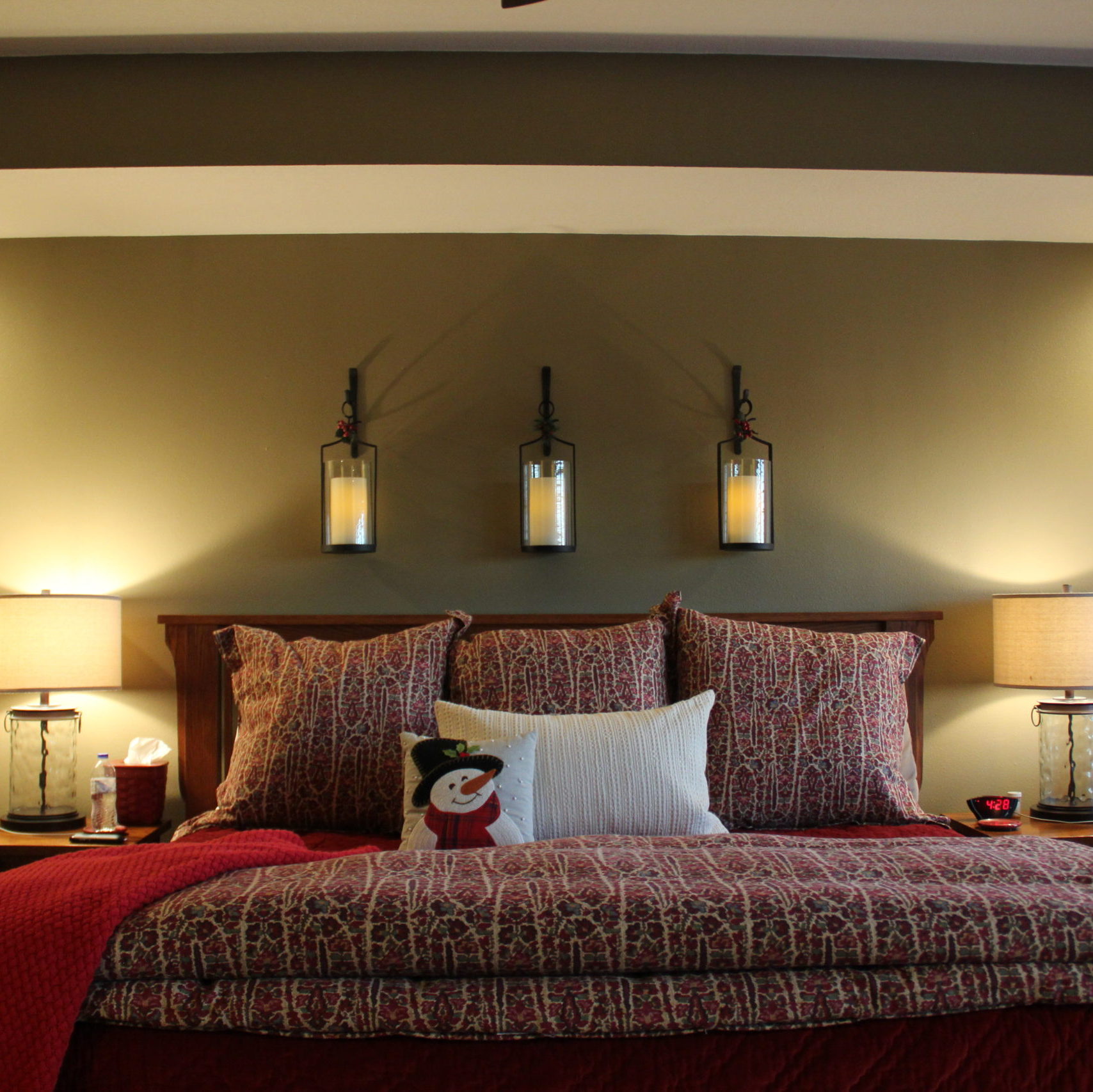 I love the pop of color in the master bedroom. I change out our pick stitch cotton quilt by Pottery Barn for a deep red velvet one they sell. Only bad part is that its completely decorative. The backside is satin meaning its slippery and it holds no heat but it sure is pretty!