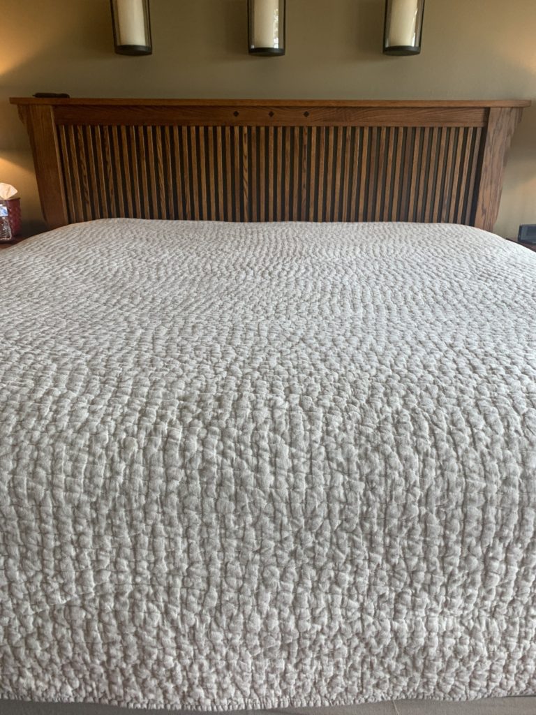 This is the third Pottery Barn pick stitch quilt I have purchased (one was for queen size, then change in color, then king size) It's a cotton/linen quilt that I love the look and feel of.