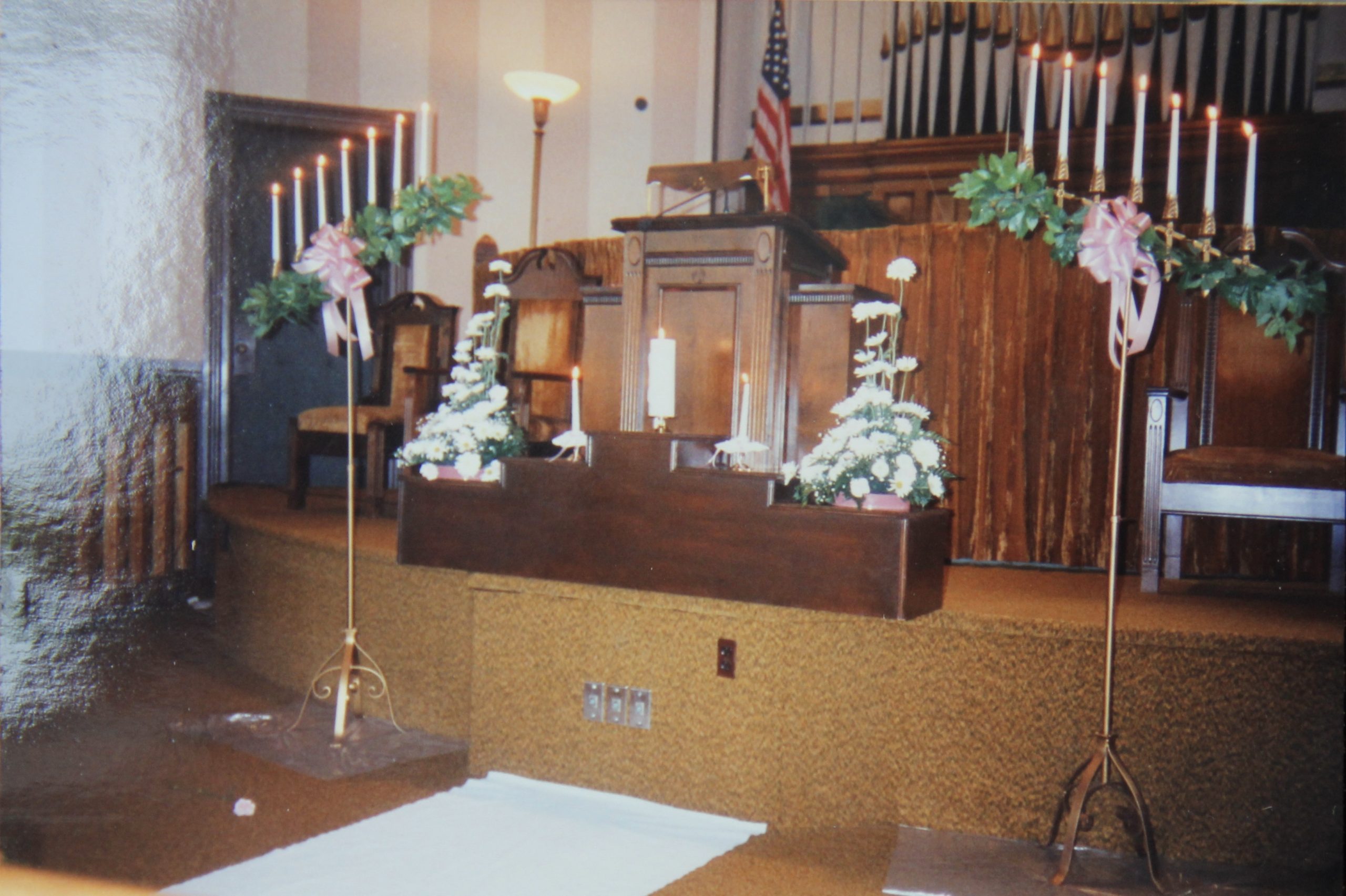 Flowers by Wolf Floral, the rented candelabras, the unity candle and floor runner