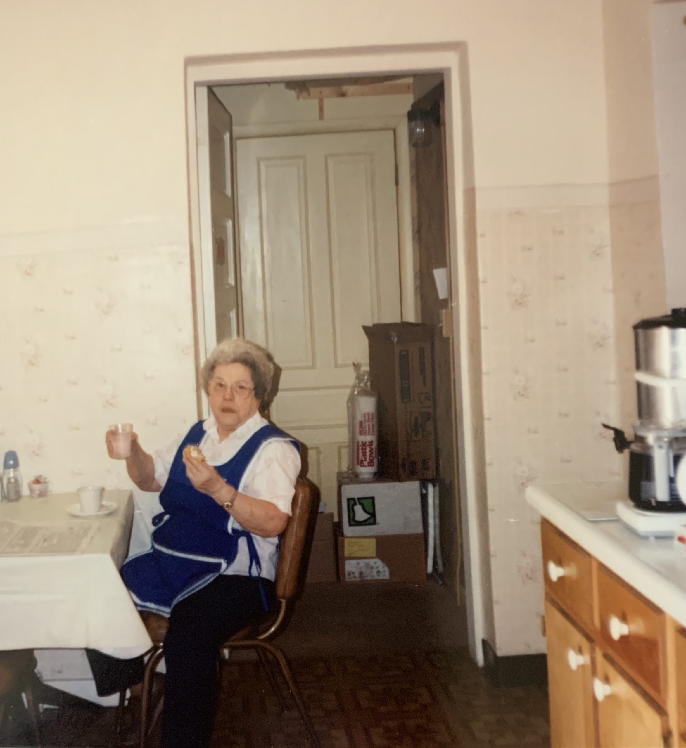 This is how I remember Mary. Either cooking or sitting down with us for our meal