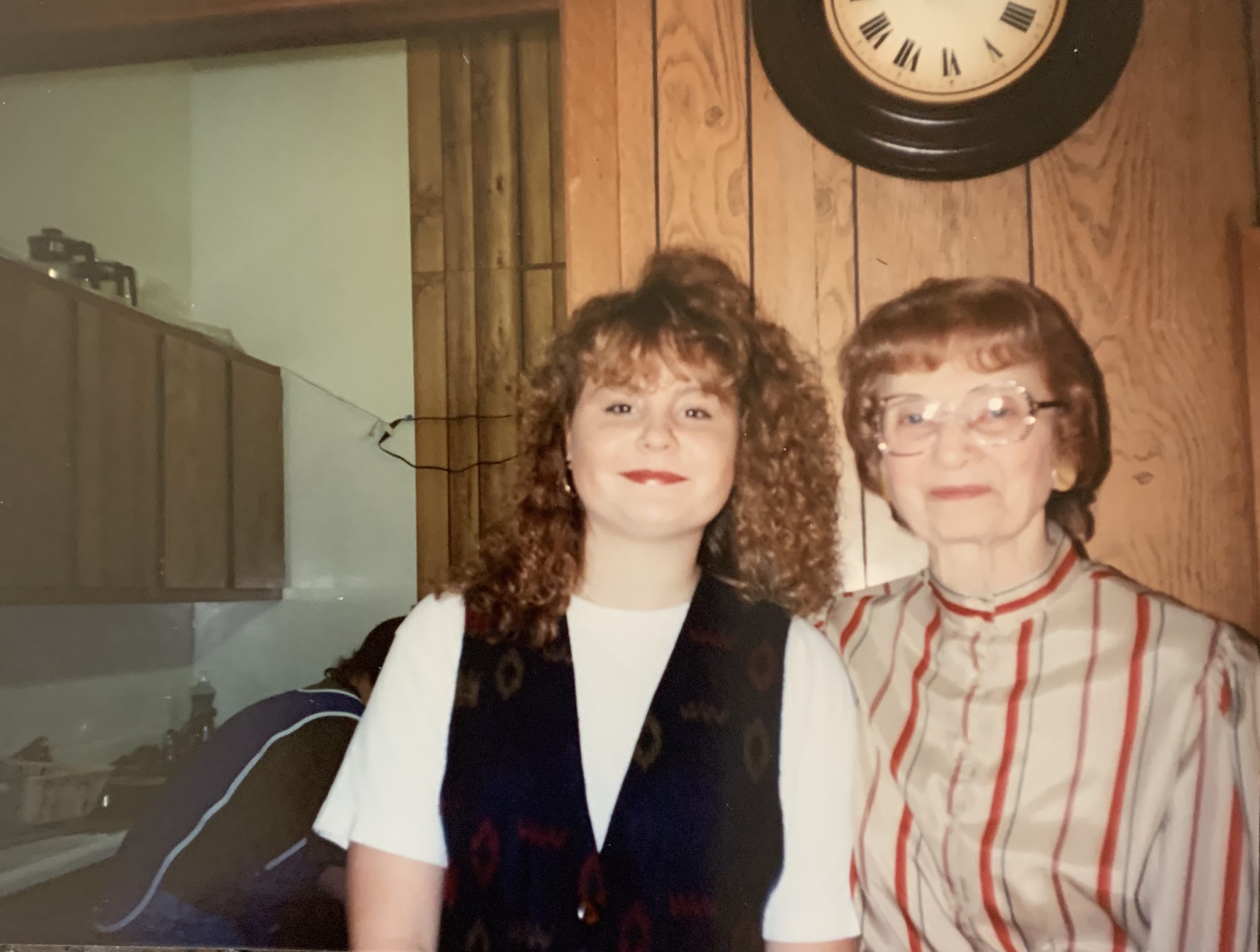 I'm standing next to my first customer. Alice came in everyday. She was easy to wait on and always looked so proper.