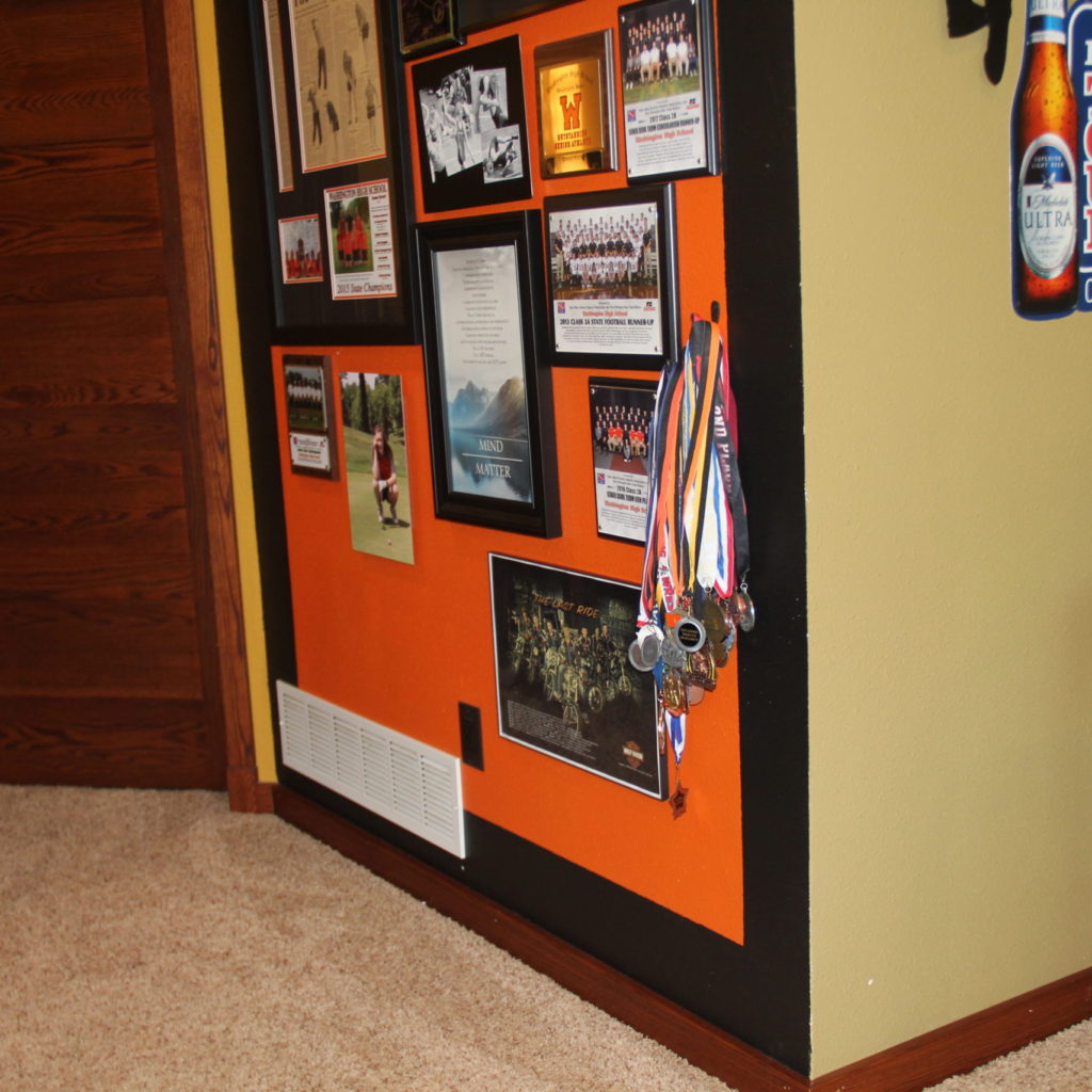 School senior posters, a robe hook for medals & metal pictures