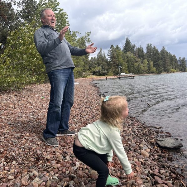 If this doesn't make you smile. She tried skipping a rock like Papa.