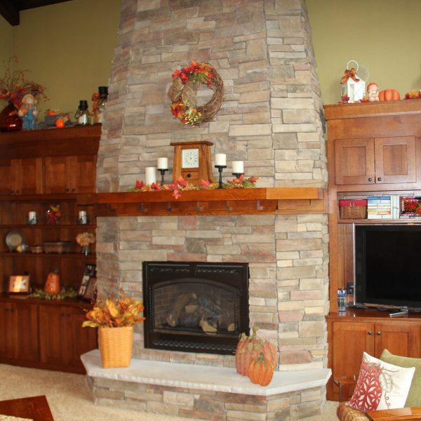 One of the main focal points in the room is our fireplace. Perfect for family pictures, hanging stockings and decorating. Candles are a mainstay on the mantle.