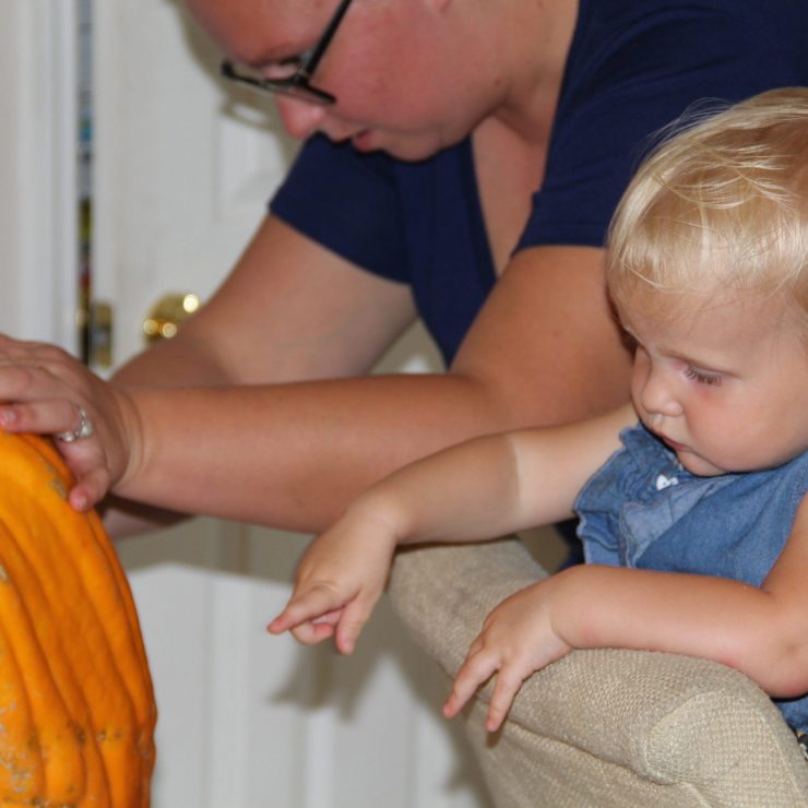 Brianna and Hadley working on pumpkins