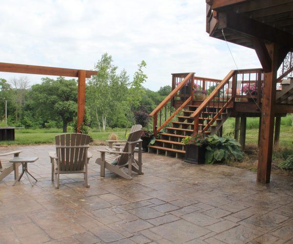 The patio got a fresh coat of sealant. The weeds have been sprayed and next is layering mulch.