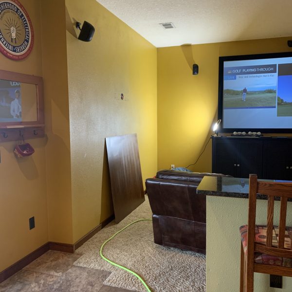 Hawkeye gold walls and an idea to warm the space putting a little custom paneling up.