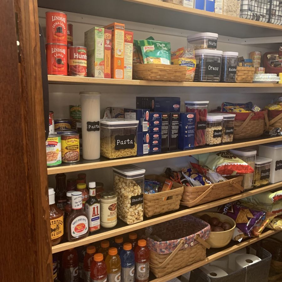 This longer wall is mostly for food. Tip, when I put the pancake mix and pastas in air tight containers I cut the cooking instructions out and put those in my recipe basket