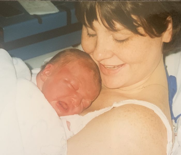 Sarah, warm and content born two days before Christmas