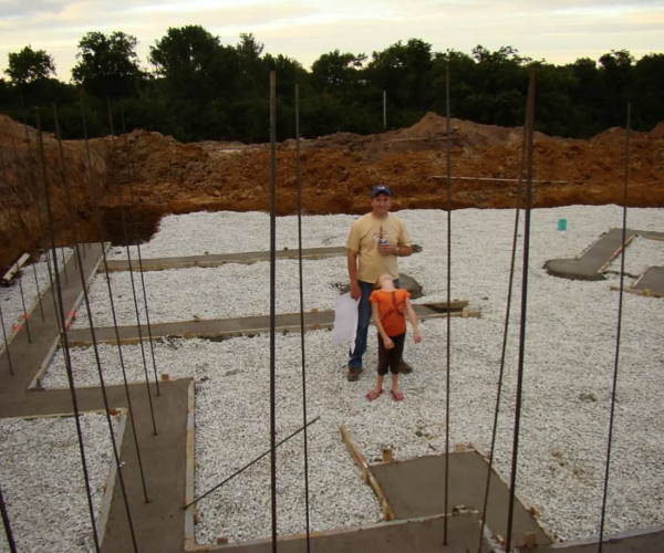 Fall of 2010 was when we started building. Here Dave is having a beer in his "bar" Hi Emily