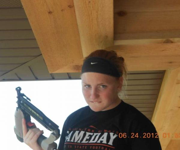 The kids always "got" to help. I love this one of Sarah with a nail gun. It should read "Don't mess with me."